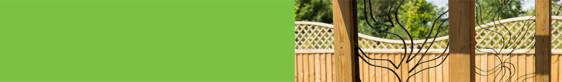 A close up of a fence behind wooden structures.